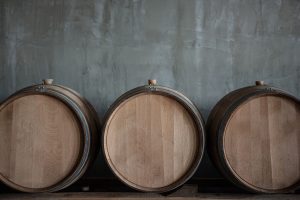 Wine barrels in a cellar. 
