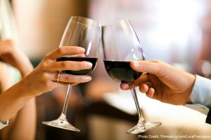 A toast with red wine. Visit Italics Wine to experience delicious red wine